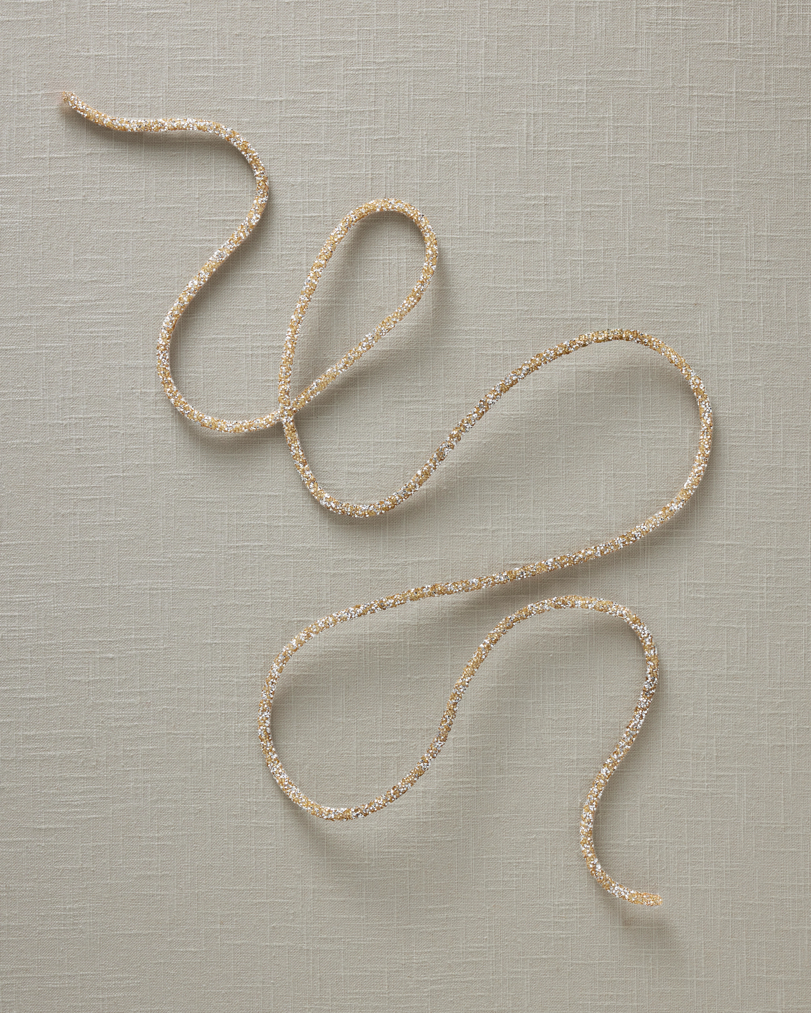 Product styling glitter cord garland